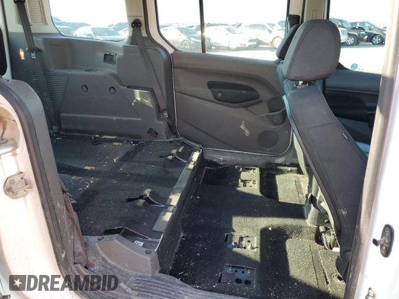 2022 Ford Transit Connect XL с VIN NM0GS9E20N1523749, выставлен на аукционе Copart как лот 57582305 с пробегом 78 786 миль миль и Списание • Salvage title. История ставок и продаж доступна на DreamBid. Изображение 11.
