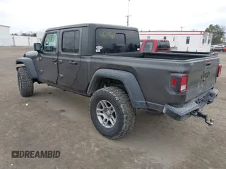 2020 Jeep Gladiator Sport S with VIN 1C6HJTAG8LL141535, listed as a IAAI auction lot 41673860 with 67,160 mi miles. Bid and sale history available at carsss.com. Image 3.