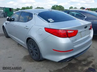 2015 Kia Optima EX with VIN 5XXGN4A70FG360623, listed as a IAAI auction lot 42112315 with 262,058 mi miles. Bid and sale history available at carsss.com. Image 3.