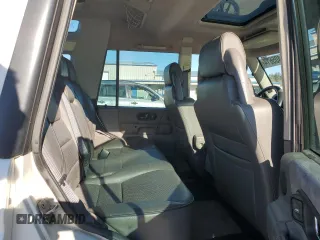 2000 Land Rover Discovery Cloth with VIN SALTY1241YA250907, listed as a Copart auction lot 81405614 with 95,310 mi miles and Salvage Title. Bid and sale history available at DreamBid. Image 11.