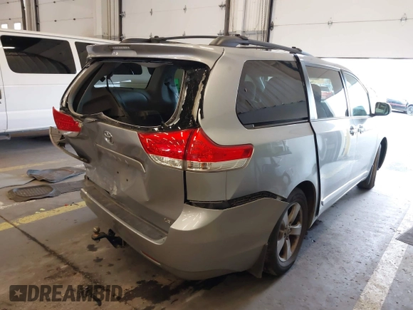 2012 Toyota Sienna LE AAS with VIN 5TDKK3DCXCS271299, listed as a IAAI auction lot 41376742 with 134,968 mi miles. Bid and sale history available at carsss.com. Image 4.