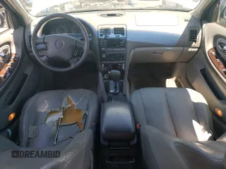 2000 Nissan Maxima GXE z VIN JN1CA31D9YT543874, wystawiony jako Copart lot #69275784 z przebiegiem 214 833 mil mil oraz Szkoda całkowita • Salvage title. Historia ofert i sprzedaży dostępna na DreamBid. Obrazek 8.