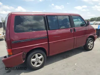 1999 Volkswagen EuroVan с VIN WV2MH2703XH045037, выставлен на аукционе Copart как лот 57109265 с пробегом 265 855 миль миль и Списание • Salvage title. История ставок и продаж доступна на DreamBid. Изображение 3.