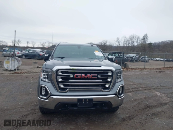 2021 GMC Sierra 1500 SLT z VIN 3GTU9DET8MG413416, wystawiony jako IAAI lot #41935465 z przebiegiem 70 547 mil mil oraz . Historia ofert i sprzedaży dostępna na DreamBid. Obrazek 12.