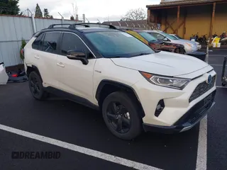 2021 Toyota RAV4 Hybrid XSE with VIN 4T3E6RFV8MU056524, listed as a IAAI auction lot 41788452 with 56,751 mi miles. Bid and sale history available at carsss.com. Image 1.