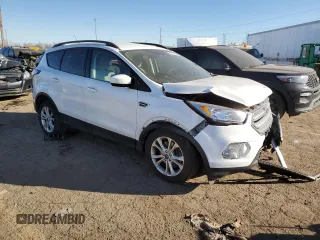 2018 Ford Escape SE with VIN 1FMCU0G98JUB62583, listed as a Copart auction lot 87894835 with 135,965 mi miles and Clean Title. Bid and sale history available at carsss.com. Image 4.