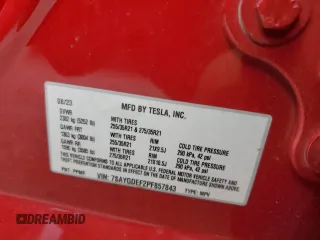2023 Tesla Model Y Performance z VIN 7SAYGDEF2PF857843, wystawiony jako Copart lot #57324255 z przebiegiem 22 618 mil mil oraz Szkoda całkowita • Salvage title. Historia ofert i sprzedaży dostępna na DreamBid. Obrazek 13.