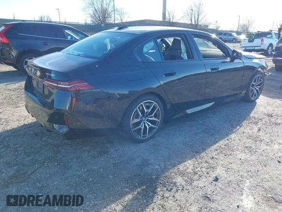 2024 BMW i5 eDrive40 with VIN WBY33FK00RCP37858, listed as a IAAI auction lot 41016747 with Not provided miles and . Bid and sale history available at DreamBid. Image 4.