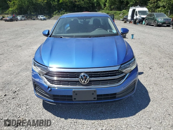 2023 Volkswagen Jetta S with VIN 3VW5M7BU6PM042471, listed as a Copart auction lot 56950155 with 7,043 mi miles and Salvage title. Bid and sale history available at DreamBid. Image 5.