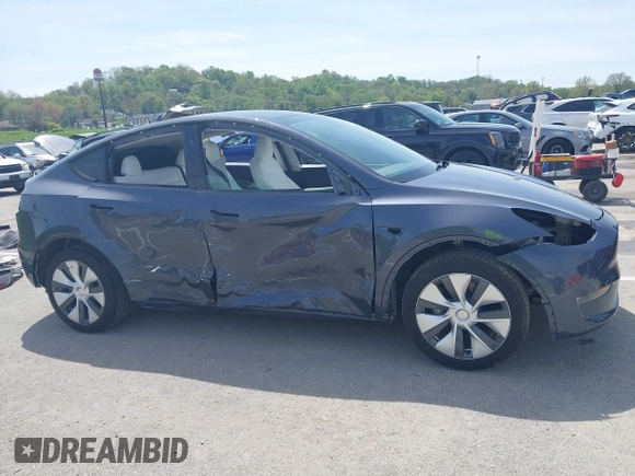 2023 Tesla Model Y Long Range z VIN 7SAYGDEE1PA158661, wystawiony jako IAAI lot #41983897 z przebiegiem 20 176 mil mil oraz . Historia ofert i sprzedaży dostępna na DreamBid. Obrazek 14.