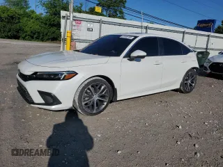 2024 Honda Civic Touring with VIN 2HGFE1F92RH323905, listed as a Copart auction lot 57448765 with 9,680 mi miles and Salvage title. Bid and sale history available at DreamBid. Image 1.