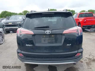 2016 Toyota RAV4 XLE with VIN 2T3WFREV9GW276278, listed as a IAAI auction lot 41906293 with 112,000 mi miles. Bid and sale history available at carsss.com. Image 16.