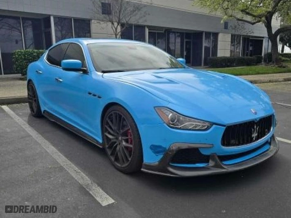 2014 Maserati Ghibli S Q4 with VIN ZAM57RTA7E1089301, listed as a Copart auction lot 54070585 with 59,787 mi miles and Salvage Title. Bid and sale history available at carsss.com. Image 1.