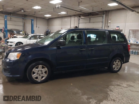 2012 Dodge Grand Caravan SE with VIN 2C4RDGBG8CR367236, listed as a IAAI auction lot 40041863 with 166,555 mi miles and . Bid and sale history available at DreamBid. Image 14.