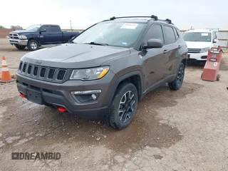 2019 Jeep Compass Trailhawk with VIN 3C4NJDDBXKT795294, listed as a IAAI auction lot 42046344 with 100,395 mi miles and . Bid and sale history available at DreamBid. Image 18.
