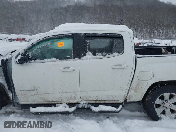 2016 GMC Canyon 4WD SLE with VIN 1GTG6CE39G1214362, listed as a IAAI auction lot 41278363 with 96,740 mi miles. Bid and sale history available at carsss.com. Image 15.