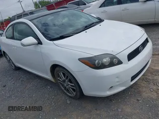 2010 Scion tC with VIN JTKDE3B79A0313508, listed as a IAAI auction lot 41970517 with 163,604 mi miles. Bid and sale history available at carsss.com. Image 1.