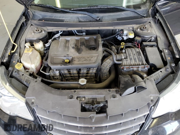 2010 Chrysler Sebring Touring with VIN 1C3CC4FBXAN220016, listed as a Copart auction lot 70784864 with 173,337 mi miles and Salvage Title. Bid and sale history available at carsss.com. Image 12.