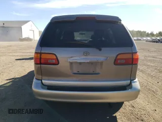 1998 Toyota Sienna LE with VIN 4T3ZF13C5WU049992, listed as a Copart auction lot 74492774 with 174,751 mi miles and Salvage Title. Bid and sale history available at carsss.com. Image 6.