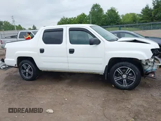 2014 Honda Ridgeline Sport z VIN 5FPYK1F70EB009711, wystawiony jako IAAI lot #42343485 z przebiegiem 154 317 mil mil oraz . Historia ofert i sprzedaży dostępna na DreamBid. Obrazek 14.