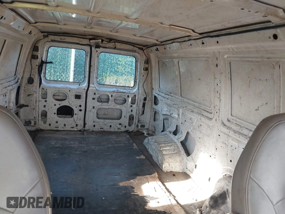 2002 Ford Econoline Cargo with VIN 1FTRE142X2HA95262, listed as a IAAI auction lot 39771693 with 204,642 mi miles. Bid and sale history available at carsss.com. Image 8.
