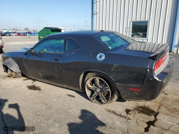 2013 Dodge Challenger SXT with VIN 2C3CDYAG4DH610808, listed as a Copart auction lot 72379304 with 180,442 mi miles and Salvage Title. Bid and sale history available at carsss.com. Image 2.