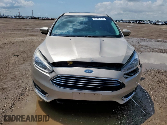 2018 Ford Focus Titanium z VIN 1FADP3J26JL279443, wystawiony jako Copart lot #58837435 z przebiegiem 136 538 mil mil oraz Szkoda całkowita • Salvage title. Historia ofert i sprzedaży dostępna na DreamBid. Obrazek 5.
