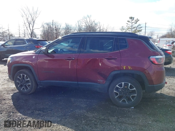 2020 Jeep Compass Trailhawk with VIN 3C4NJDDB2LT239384, listed as a IAAI auction lot 41527372 with 56,122 mi miles and . Bid and sale history available at carsss.com. Image 14.