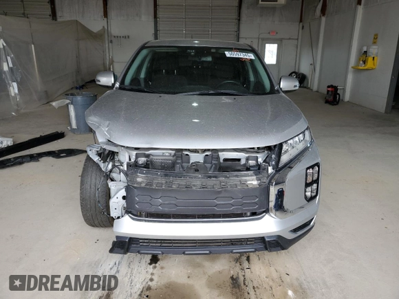 2021 Mitsubishi Outlander SE with VIN JA4APVAUXMU025835, listed as a Copart auction lot 50597345 with 86,866 mi miles and Salvage title. Bid and sale history available at DreamBid. Image 5.