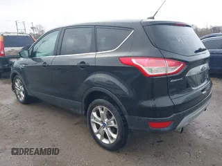 2013 Ford Escape SEL with VIN 1FMCU9H93DUC79592, listed as a IAAI auction lot 42039037 with 63,020 mi miles and . Bid and sale history available at DreamBid. Image 3.