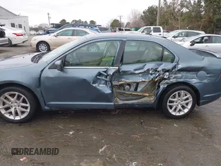 2012 Ford Fusion SEL z VIN 3FAHP0JA3CR179960, wystawiony jako IAAI lot #41513199 z przebiegiem Nie podano mil oraz . Historia ofert i sprzedaży dostępna na DreamBid. Obrazek 13.