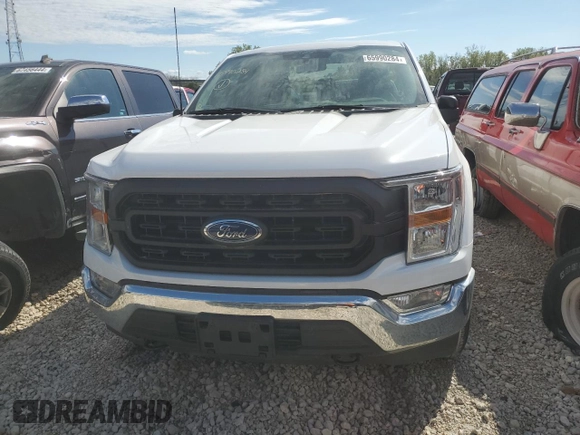2021 Ford F-150 XL with VIN 1FTMF1EB4MKE11721, listed as a Copart auction lot 65990284 with Not provided miles and Salvage title. Bid and sale history available at DreamBid. Image 5.