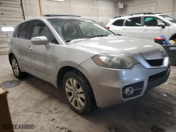 2012 Acura RDX Tech Pkg with VIN 5J8TB1H55CA003523, listed as a Copart auction lot 87387964 with 219,617 mi miles and Salvage Title. Bid and sale history available at carsss.com. Image 4.