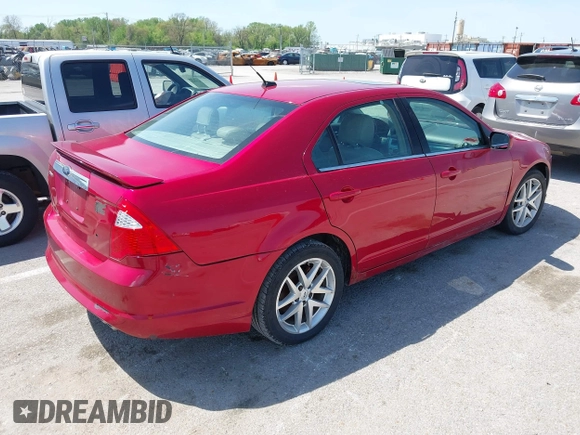 2012 Ford Fusion SEL with VIN 3FAHP0JA4CR389161, listed as a IAAI auction lot 42102898 with 215,073 mi miles. Bid and sale history available at carsss.com. Image 4.