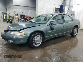 1997 Chrysler Cirrus LXi z VIN 1C3EJ56H8VN657902, wystawiony jako Copart lot #84712694 z przebiegiem 153 377 mil mil oraz Szkody całkowita. Historia ofert i sprzedaży dostępna na DreamBid. Obrazek 1.