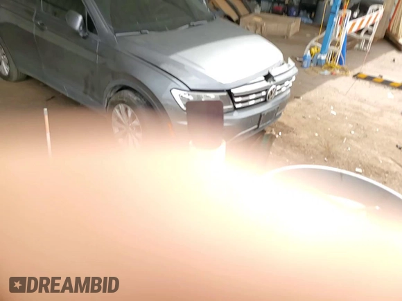 2018 Volkswagen Tiguan S with VIN 3VV1B7AXXJM054778, listed as a Copart auction lot 61294795 with 87,330 mi miles and Salvage title. Bid and sale history available at DreamBid. Image 13.