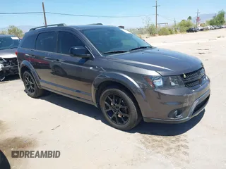 2014 Dodge Journey SXT z VIN 3C4PDCBGXET300055, wystawiony jako IAAI lot #42314802 z przebiegiem 184 070 mil mil oraz . Historia ofert i sprzedaży dostępna na DreamBid. Obrazek 1.