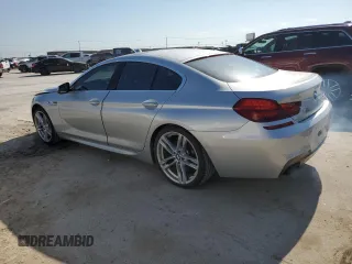 2013 BMW 6 Series 650i xDrive with VIN WBA6B4C59DD098525, listed as a Copart auction lot 67160694 with 52,413 mi miles and Salvage Title. Bid and sale history available at carsss.com. Image 2.