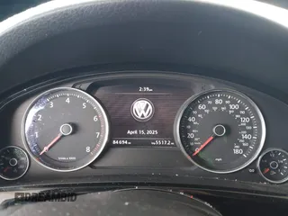 2014 Volkswagen Touareg Sport with VIN WVGEF9BP0ED015273, listed as a IAAI auction lot 42046823 with 84,694 mi miles and . Bid and sale history available at DreamBid. Image 7.