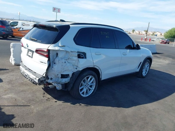 2020 BMW X5 sDrive40i with VIN 5UXCR4C03LLT19500, listed as a IAAI auction lot 40598669 with 61,604 mi miles. Bid and sale history available at carsss.com. Image 4.