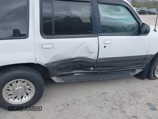 1998 Mercury Mountaineer with VIN 4M2ZU54E6WUJ22663, listed as a IAAI auction lot 42050047 with 123,766 mi miles and . Bid and sale history available at DreamBid. Image 6.