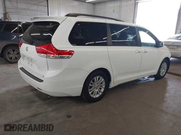 2012 Toyota Sienna XLE AAS z VIN 5TDYK3DC2CS196897, wystawiony jako IAAI lot #41762345 z przebiegiem 183 188 mil mil oraz . Historia ofert i sprzedaży dostępna na DreamBid. Obrazek 4.