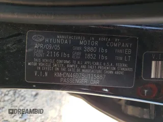 2005 Hyundai Elantra GLS z VIN KMHDN46D75U115887, wystawiony jako Copart lot #54938955 z przebiegiem 101 490 mil mil oraz Szkoda całkowita • Salvage title. Historia ofert i sprzedaży dostępna na DreamBid. Obrazek 12.