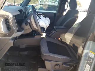 2023 Ford Bronco z VIN 1FMEE5DP0PLB15763, wystawiony jako Copart lot #45592725 z przebiegiem 26 672 mil mil oraz Szkoda całkowita • Salvage title. Historia ofert i sprzedaży dostępna na DreamBid. Obrazek 7.