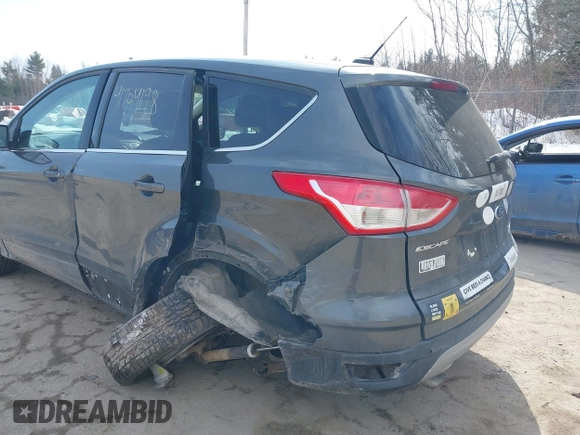 2015 Ford Escape SE with VIN 1FMCU0GXXFUB99852, listed as a IAAI auction lot 41704198 with 84,735 mi miles. Bid and sale history available at carsss.com. Image 6.