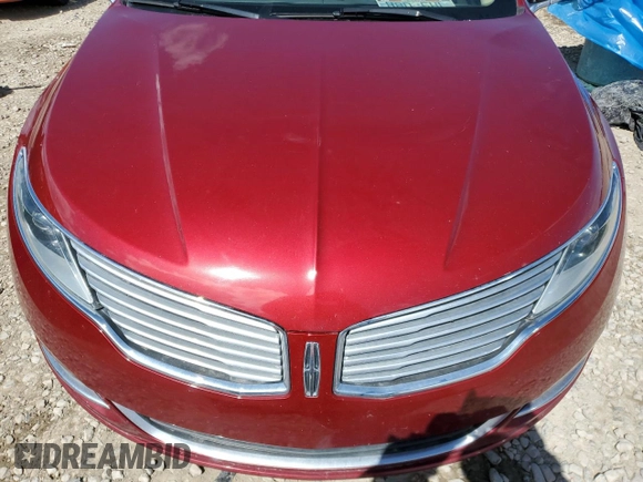 2013 Lincoln MKZ z VIN 3LN6L2G95DR804619, wystawiony jako Copart lot #57101315 z przebiegiem Nie podano mil oraz Szkoda całkowita • Salvage title. Historia ofert i sprzedaży dostępna na DreamBid. Obrazek 11.