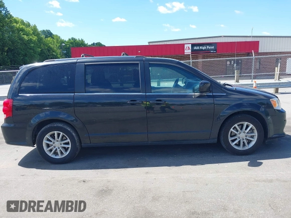 2018 Dodge Grand Caravan SXT z VIN 2C4RDGCG9JR343510, wystawiony jako IAAI lot #42347333 z przebiegiem 142 430 mil mil oraz . Historia ofert i sprzedaży dostępna na DreamBid. Obrazek 14.