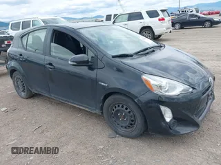 2015 Toyota Prius One z VIN JTDKDTB32F1577718, wystawiony jako IAAI lot #42290640 z przebiegiem 156 605 mil mil oraz . Historia ofert i sprzedaży dostępna na DreamBid. Obrazek 1.