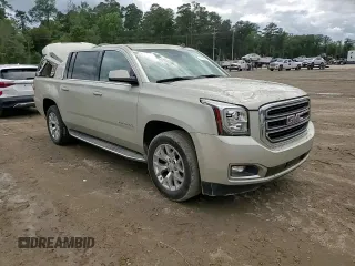 2015 GMC Yukon XL SLT with VIN 1GKS1HKC5FR168608, listed as a Copart auction lot 71564384 with 197,538 mi miles and Salvage Title. Bid and sale history available at carsss.com. Image 11.