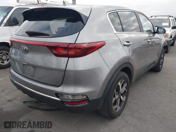 2020 Kia Sportage LX with VIN KNDPM3AC5L7759283, listed as a IAAI auction lot 41901056 with 71,123 mi miles and . Bid and sale history available at carsss.com. Image 4.